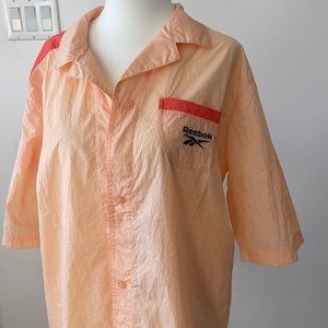 Reebok pink shirt (small)